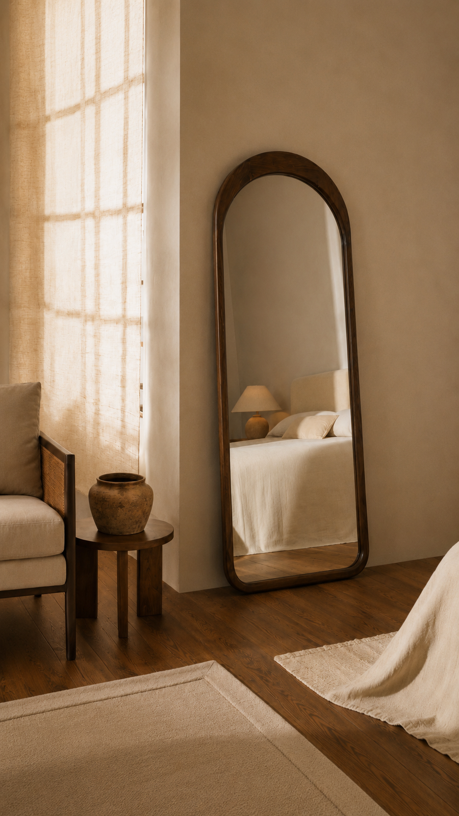 Artessa arched full-length mirror in a bedroom, mobile crop