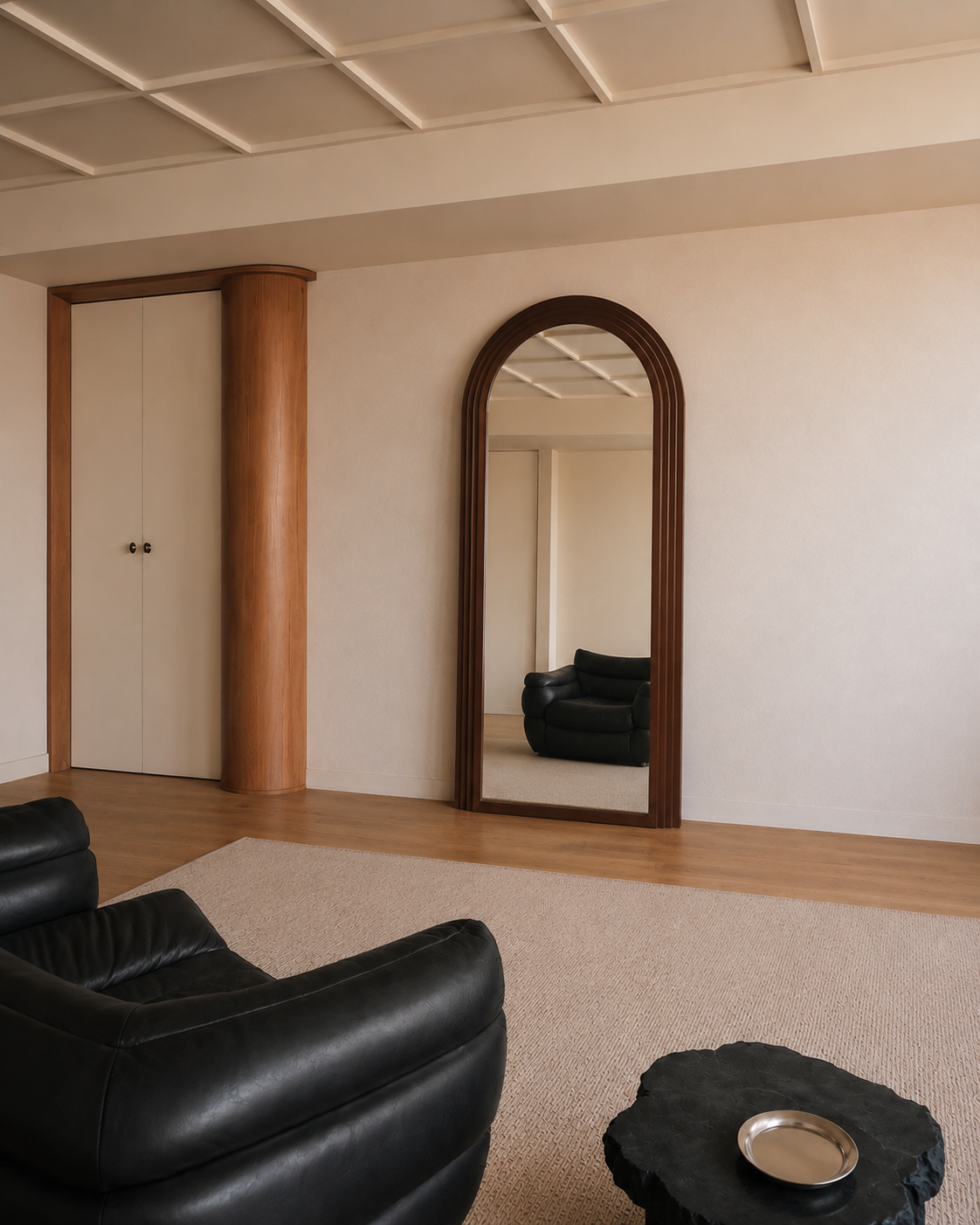 Cassian arched floor mirror, three-quarter view showing the ribbed walnut frame