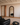 Cassian arched floor mirror, three-quarter view showing the ribbed walnut frame