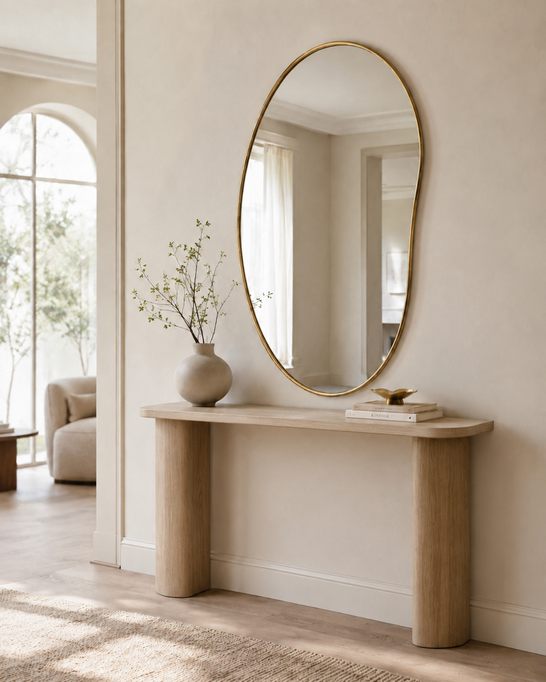 Ruve mirror at an angle above a console, showing the curved frame profile