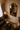 Versailles carved antique gold mirror in living room above sofa